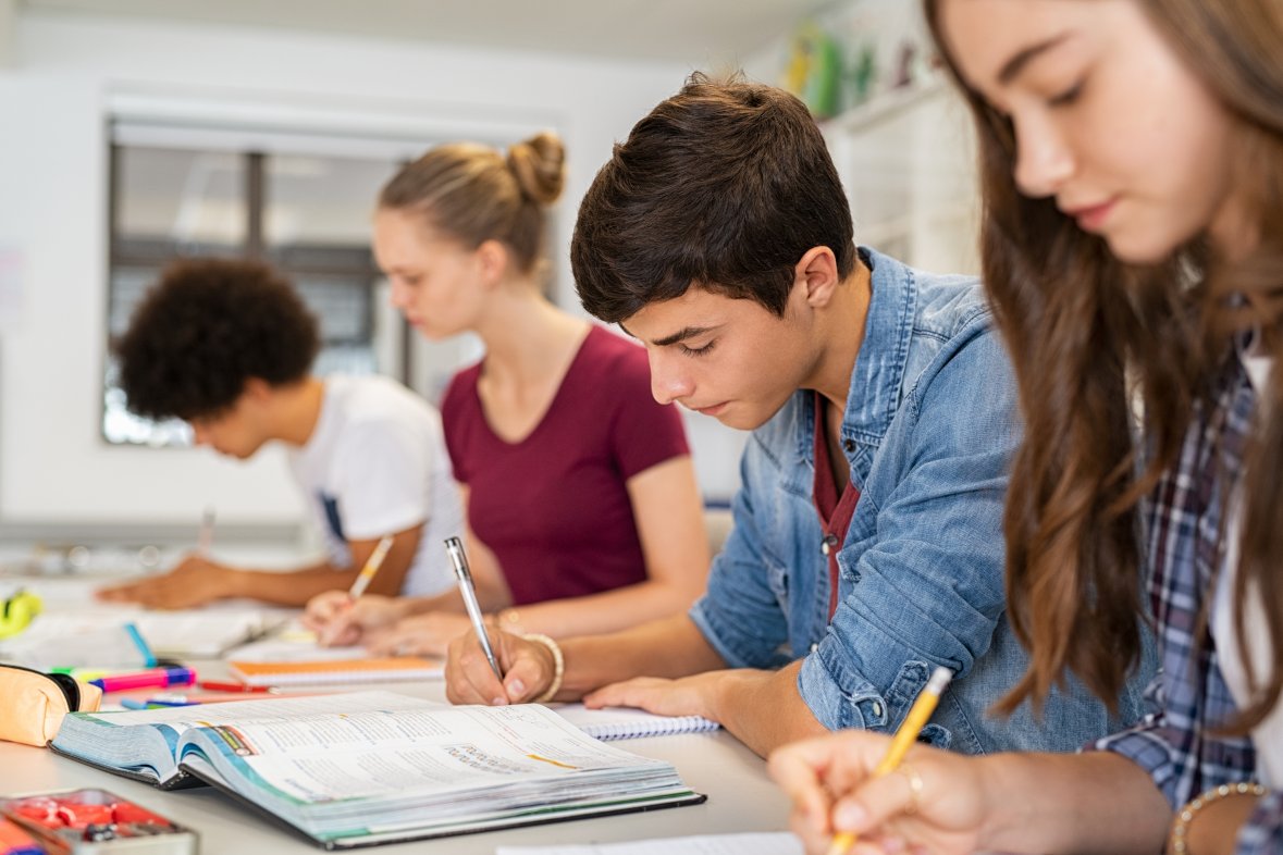 High school students doing exam in classroom High school students doing exam in classroom