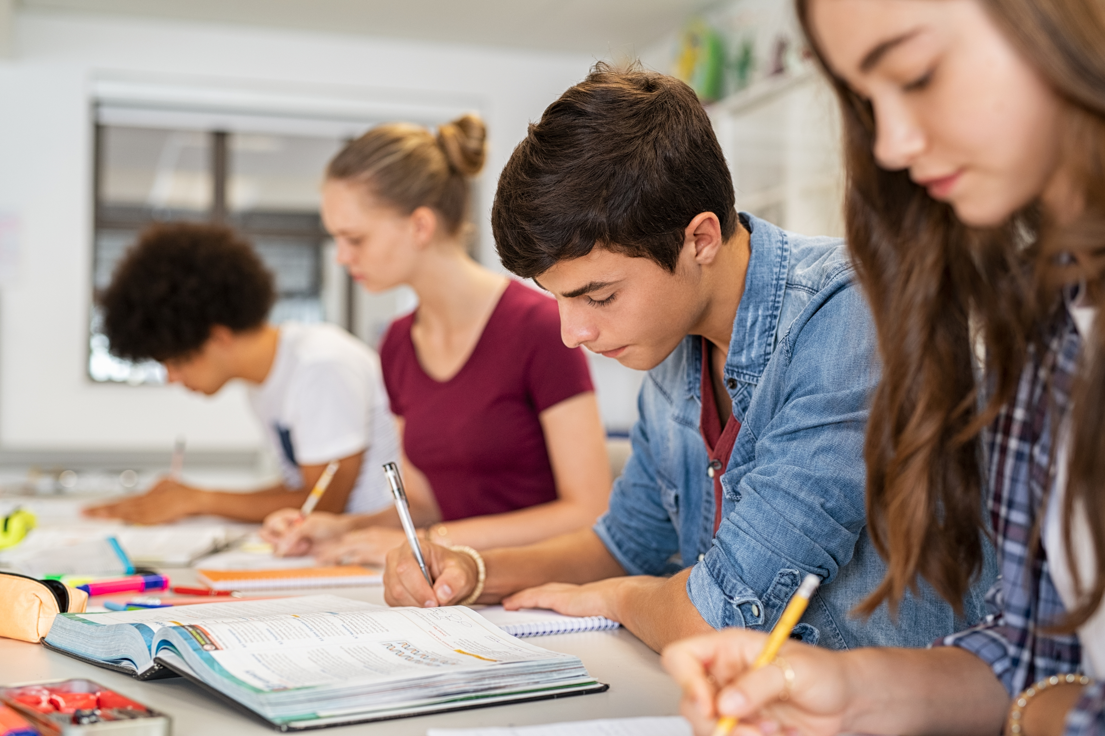 High school students doing exam in classroom High school students doing exam in classroom
