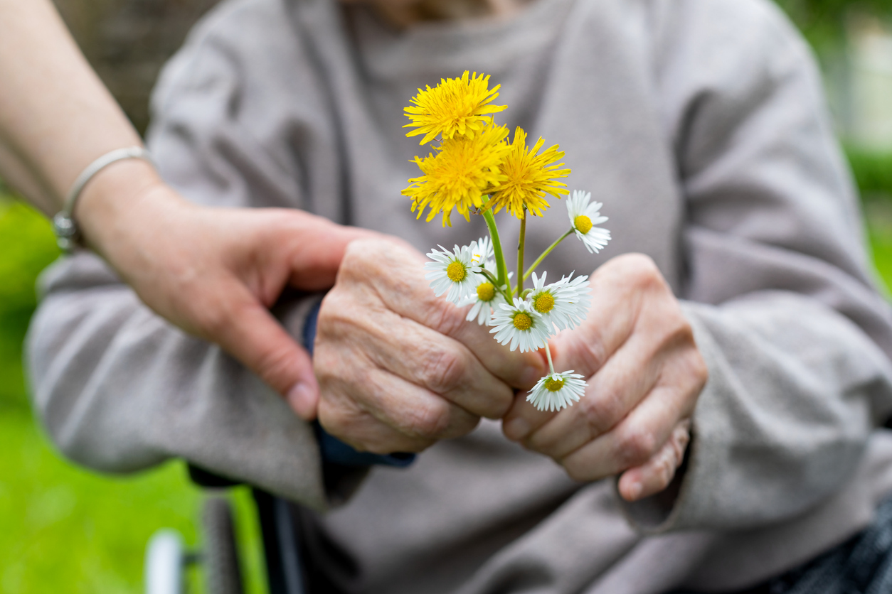 Elderly care - hands, bouquet Elderly care - hands, bouquet