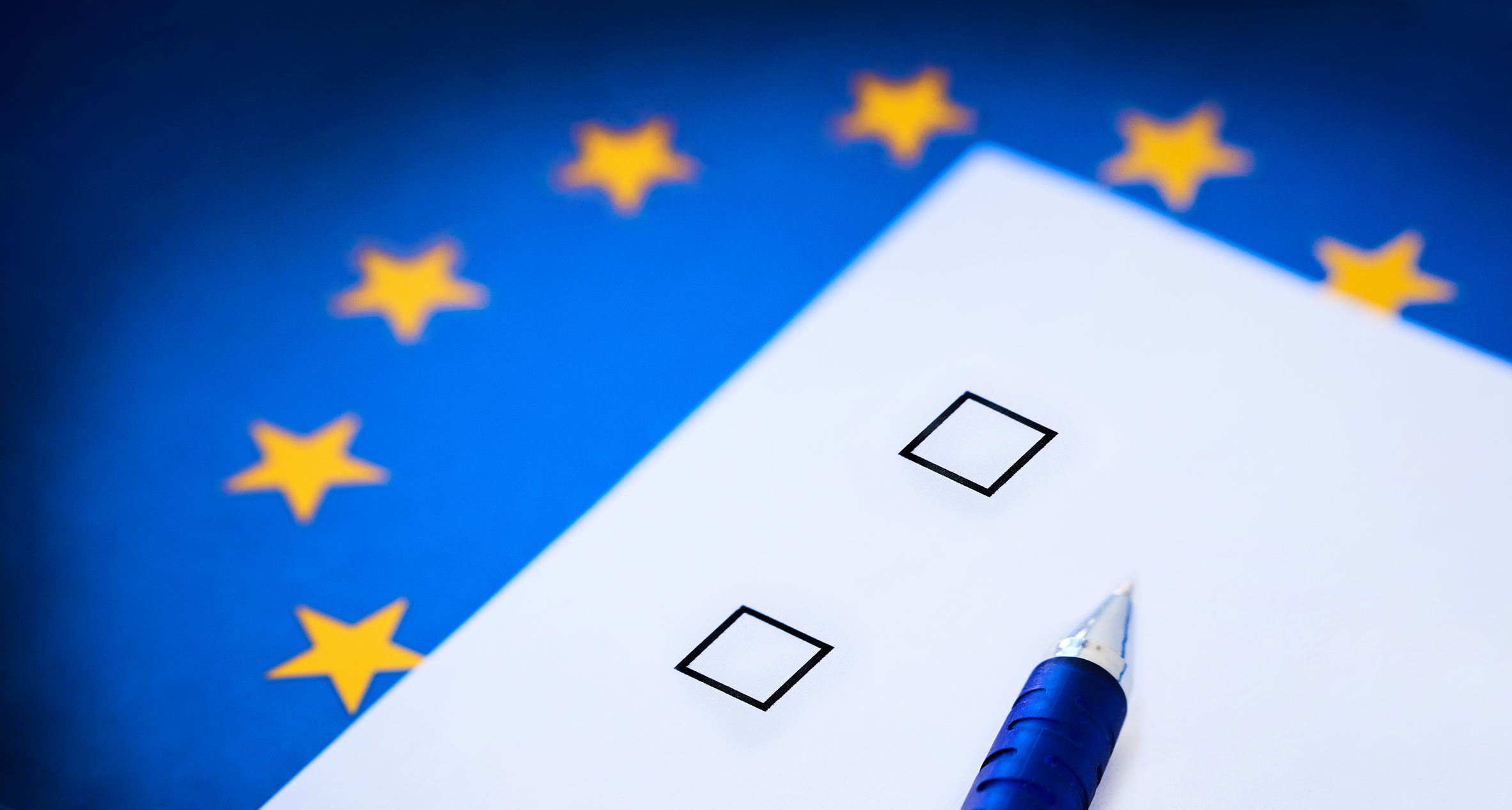 Voting card against the background of the European Union flag. Voting card against the background of the European Union flag.