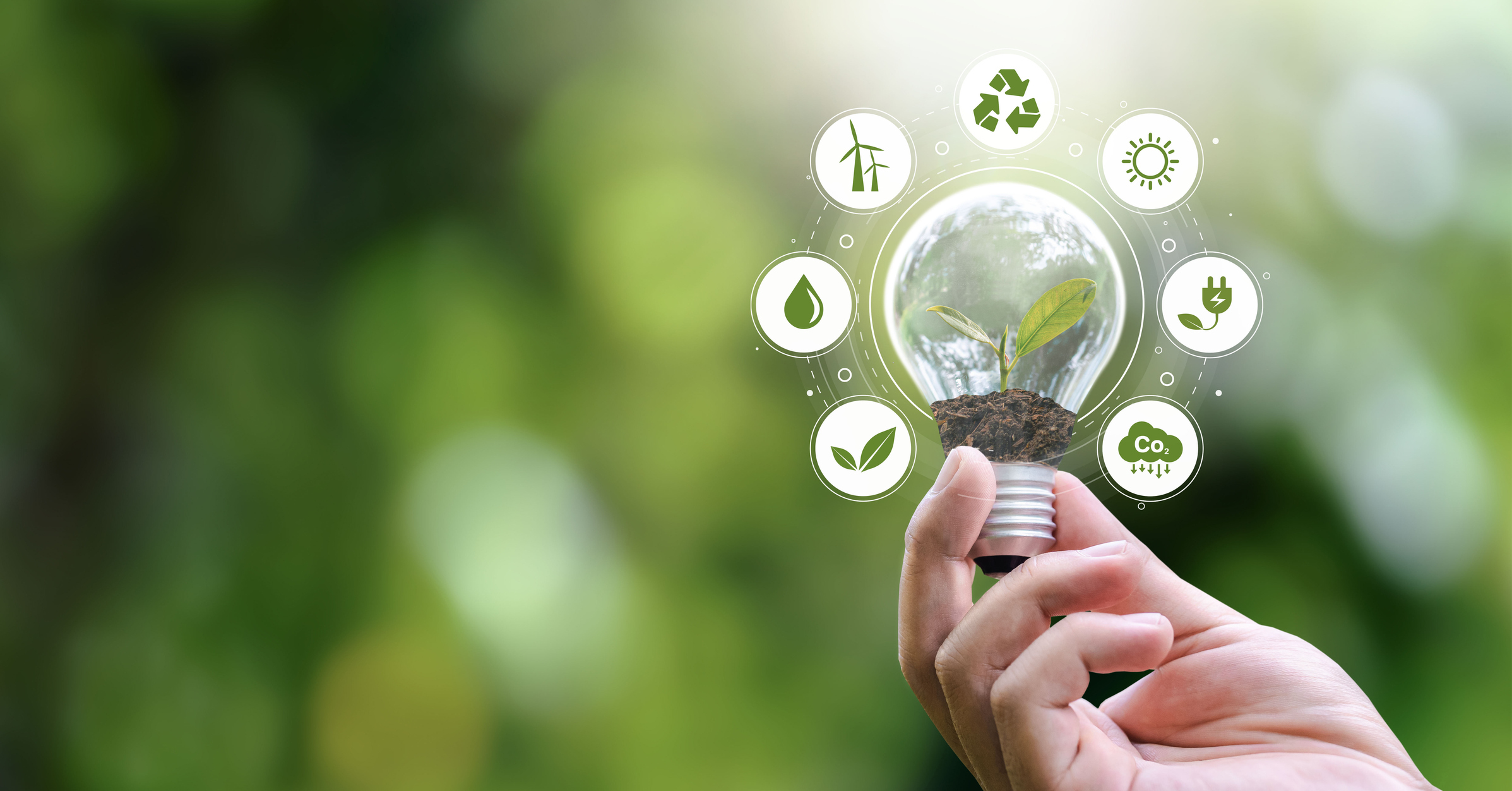 ESG Banners - Environment, Society and Governance hand holding light bulb with renewable energy icon Revolving Revenue ESG Banners - Environment, Society and Governance hand holding light bulb with renewable energy icon Revolving Revenue