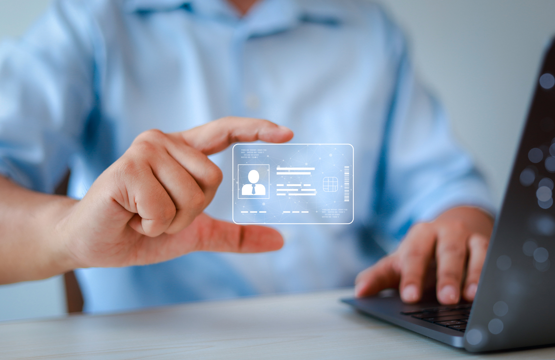 Close-up of man holding ID card. Technology and innovation concept. Digital ID card. Close-up of man holding ID card. Technology and innovation concept. Digital ID card.
