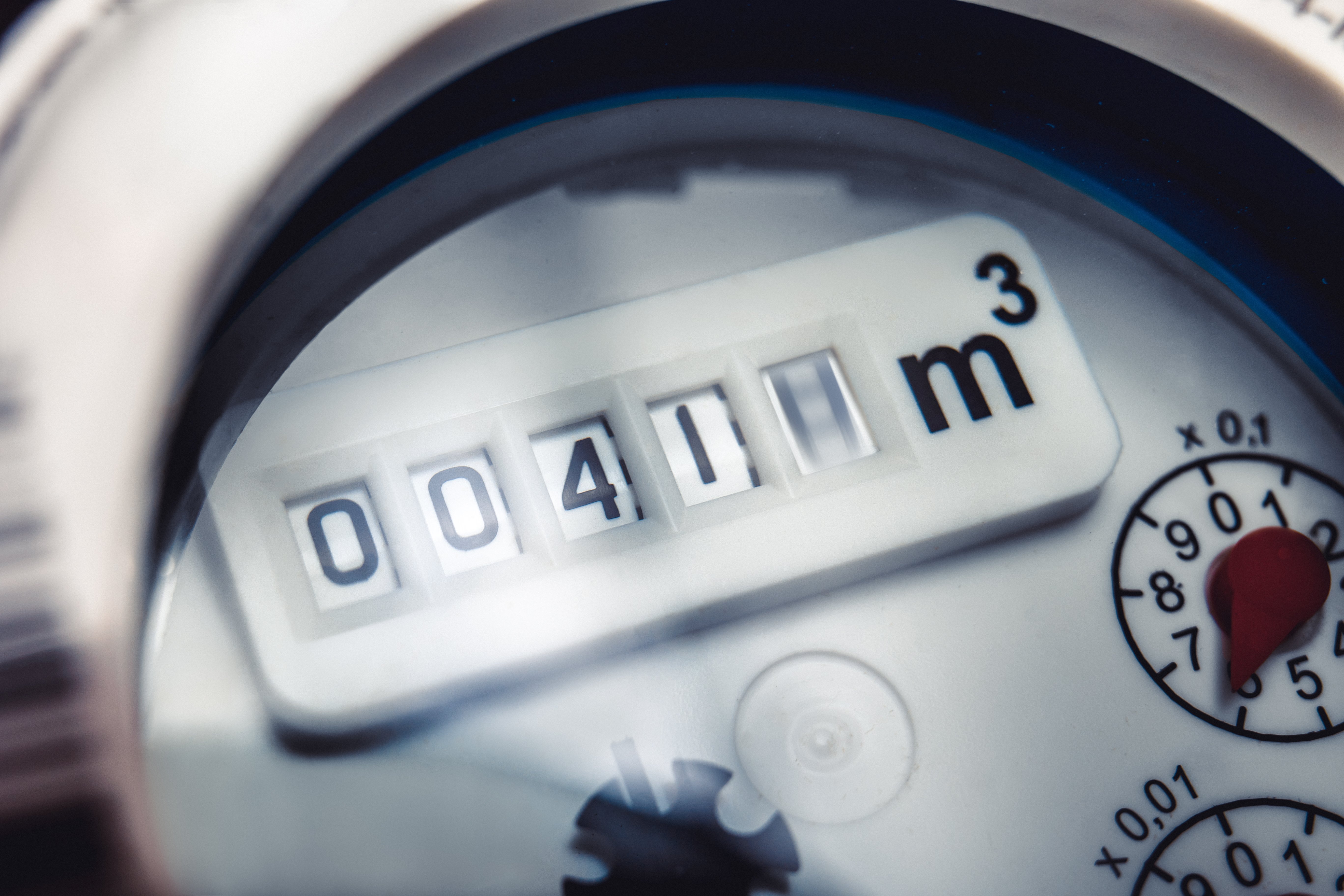 Close up of water meter with rotating digit. Close up of water meter with rotating digit.